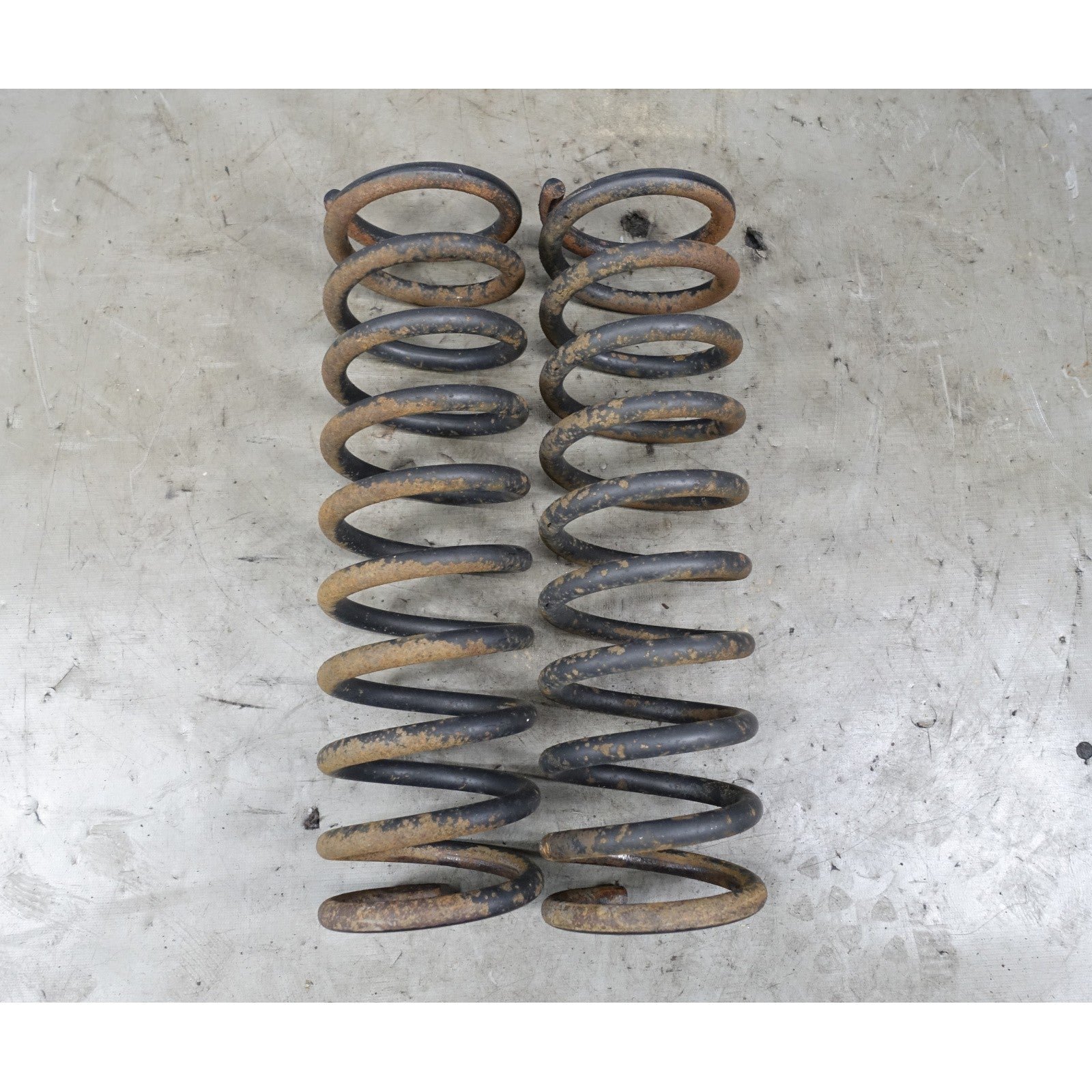 57_9b3b4c92-8454-4268-81fa-1ddfced59af8.jpg BMW E34 530i 535i Rear Axle Coil Spring Pair Left Right OEM 1989-1994 - Image 1