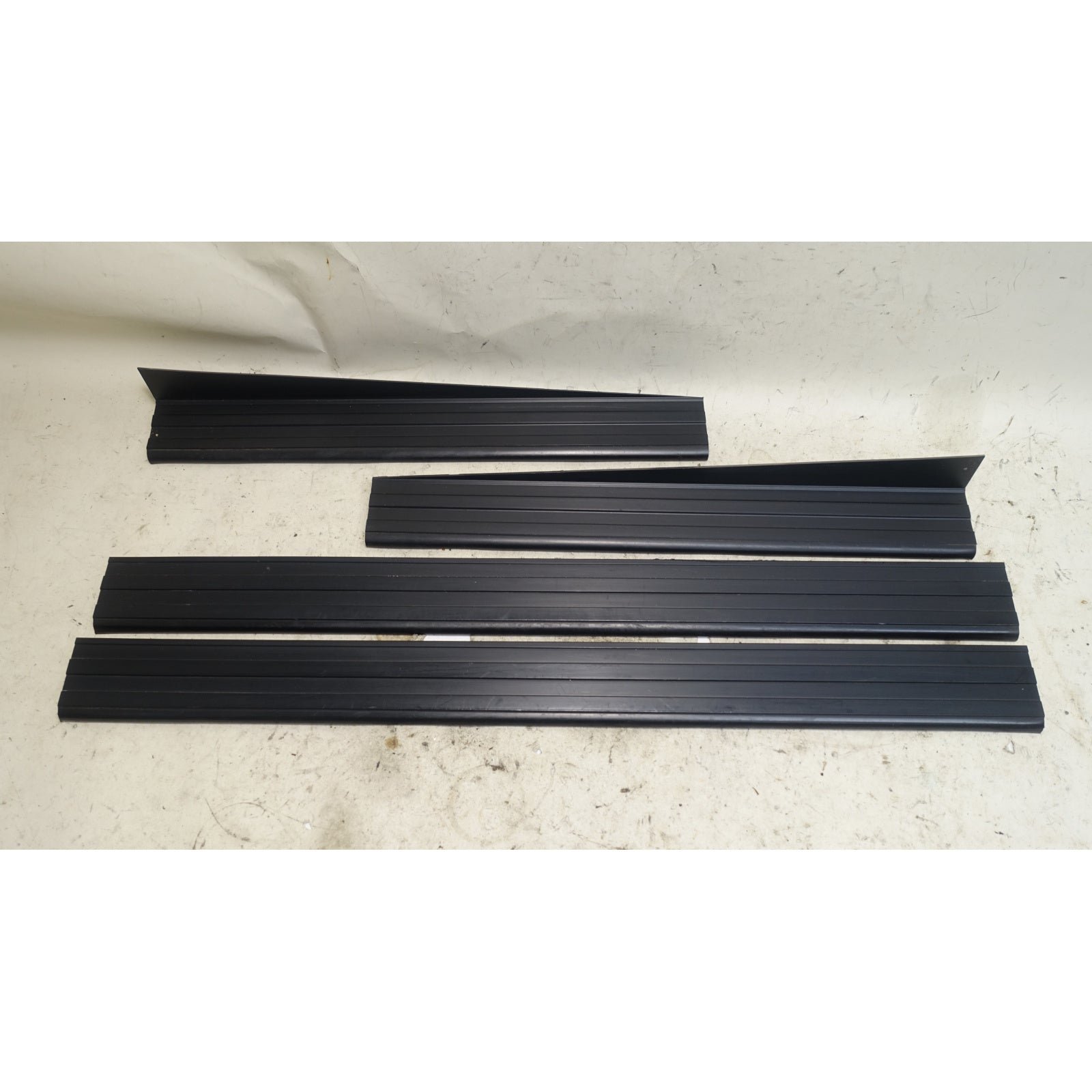 inv_055756.jpg BMW E30 Sedan Door Sill Scuff Trim Cover Set Exterior 4pc 1985-1991 OEM - Image 1