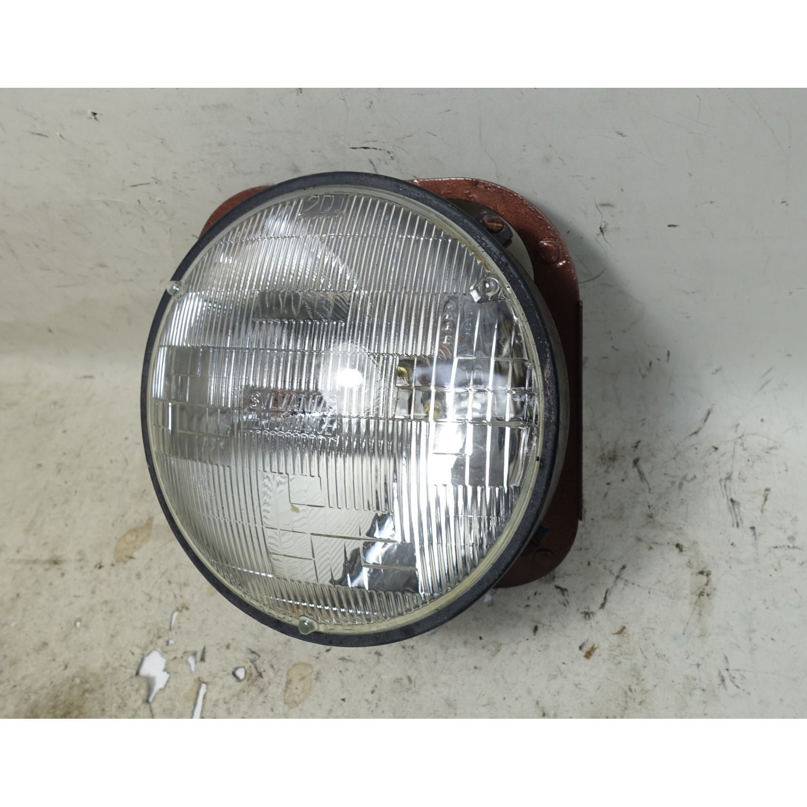 inv_056583.jpg BMW 2002 2002tii 114 E10 Left Headlight Lamp Carrier Frame OEM 1974-1976 - Image 1